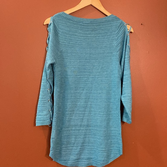Ricki’s teal blue light sweater in size extra small. - Picture 2 of 9